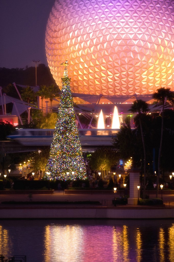 EPCOT LIGHTS UP THE HOLIDAY NIGHTS:  The giant Christmas tree at Epcot, seen with the park's iconic Spaceship Earth attraction behind it, is the centerpiece of the holiday celebration at the theme park in Lake Buena Vista, Fla.  It's all part of the Walt Disney World theme park's annual "Holidays Around the World" celebration, in which international traditions of the season unfold all throughout World Showcase. (Garth Vaughan, photographer)